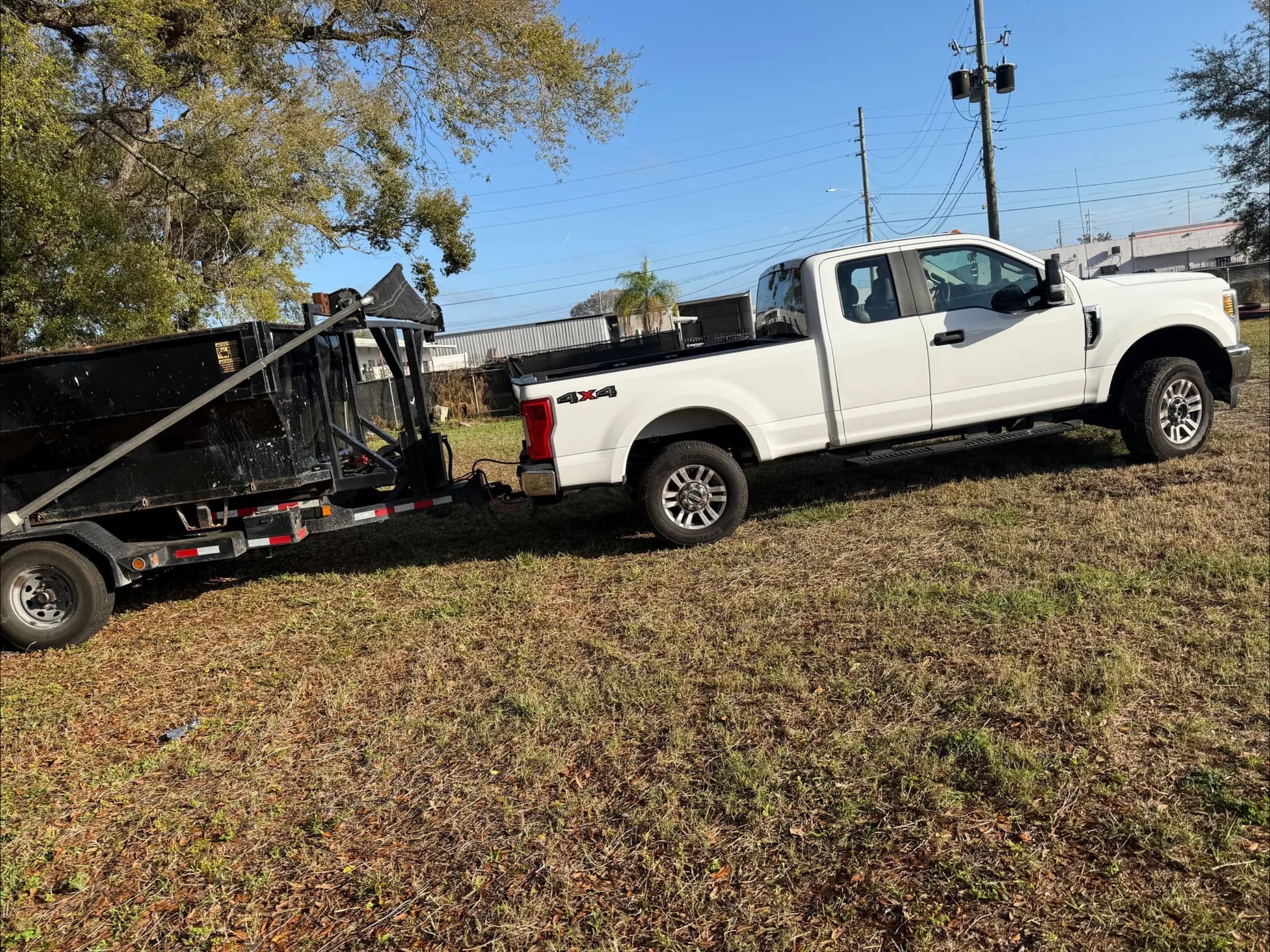 Radiant Dumpsters truck and dumpster at a Central Florida jobsite